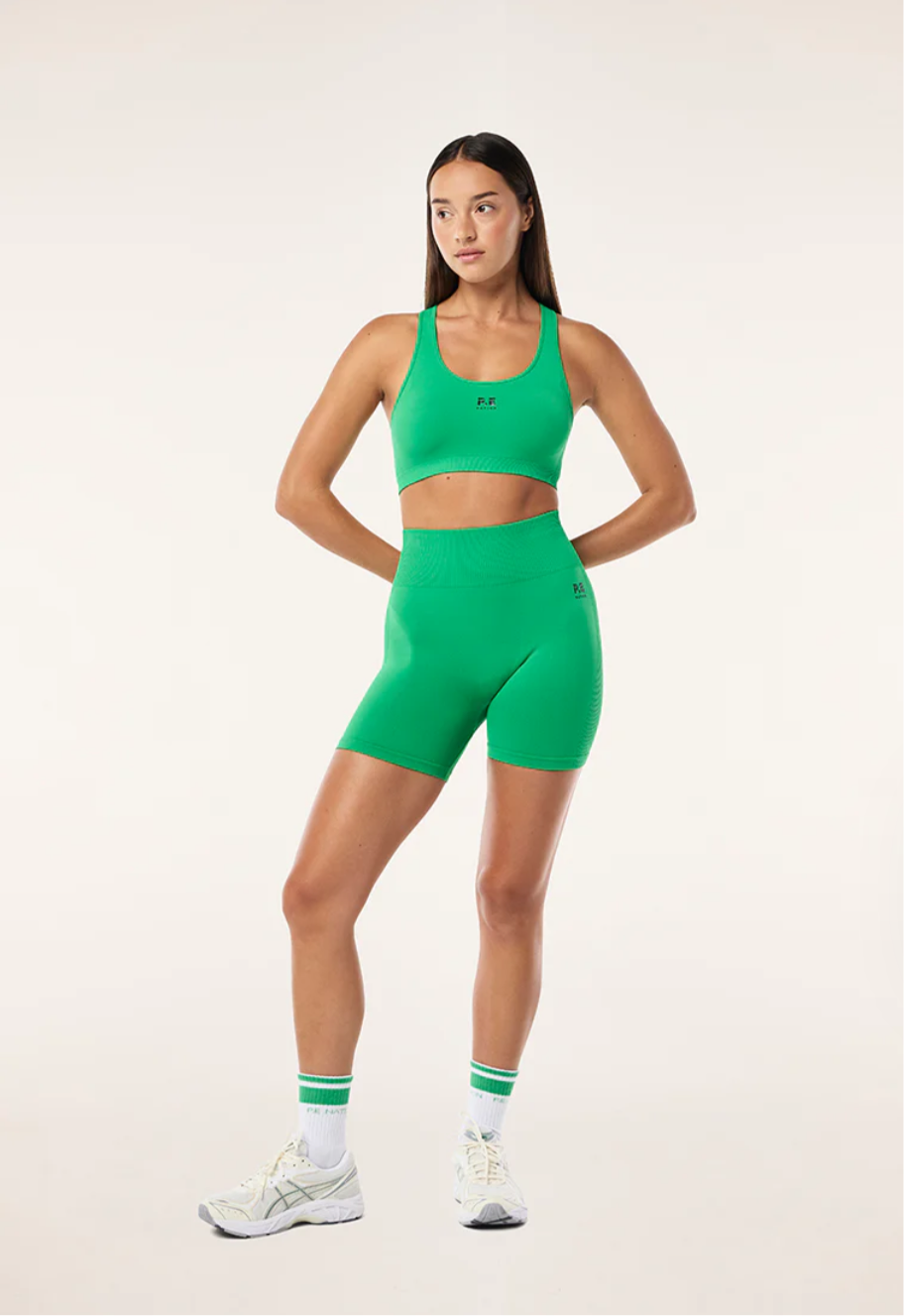 P.E. NATION RESTORE SEAMLESS SPORTS BRA IN KELLY GREEN