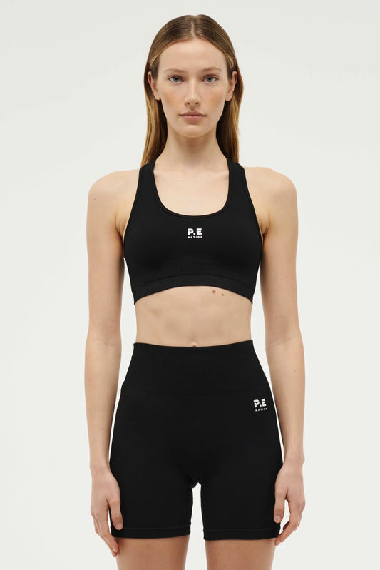P.E. NATION RESTORE SEAMLESS SPORTS BRA IN BLACK