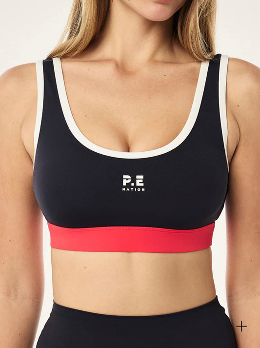 P.E. NATION PURSUIT SPORTS BRA IN DARK SAPPHIRE