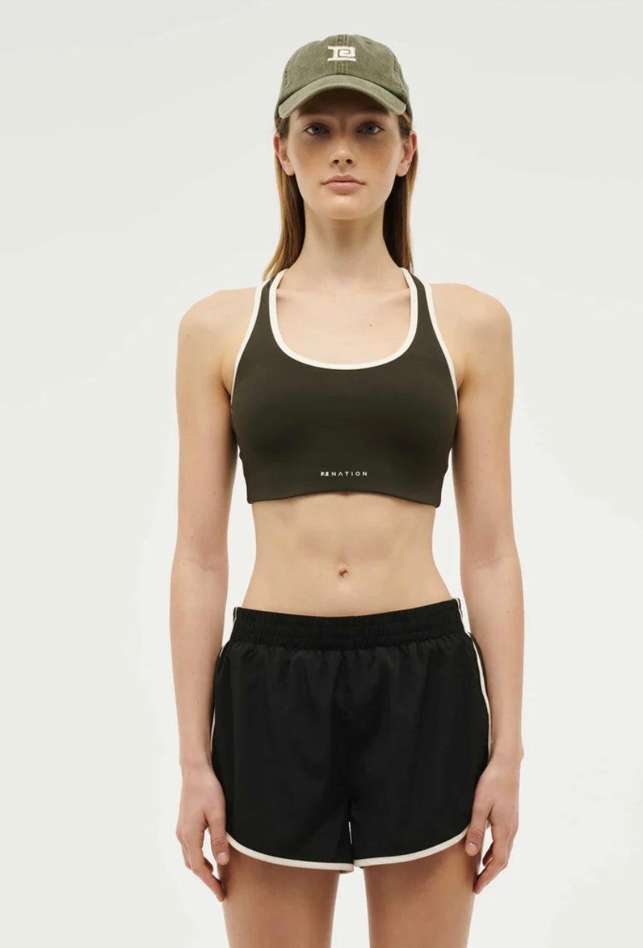 P.E. NATION STELLAR SPORTS BRA IN FOREST NIGHT / WHISPER WHITE