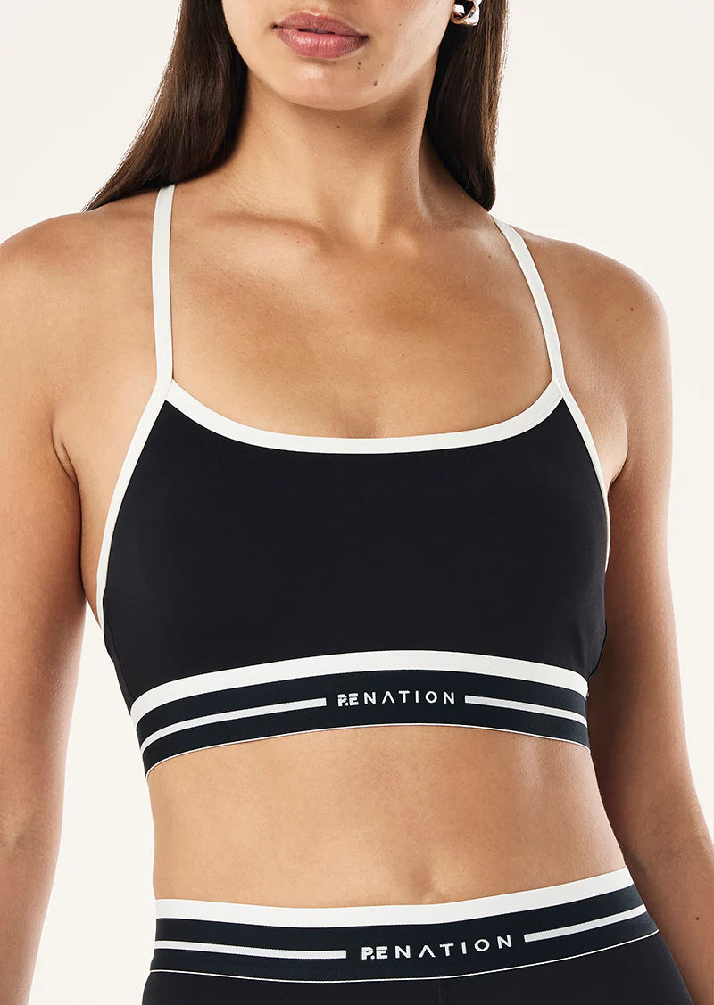 P.E. NATION ADVANTAGE SPORTS BRA IN BLACK AND WHISPER WHITE