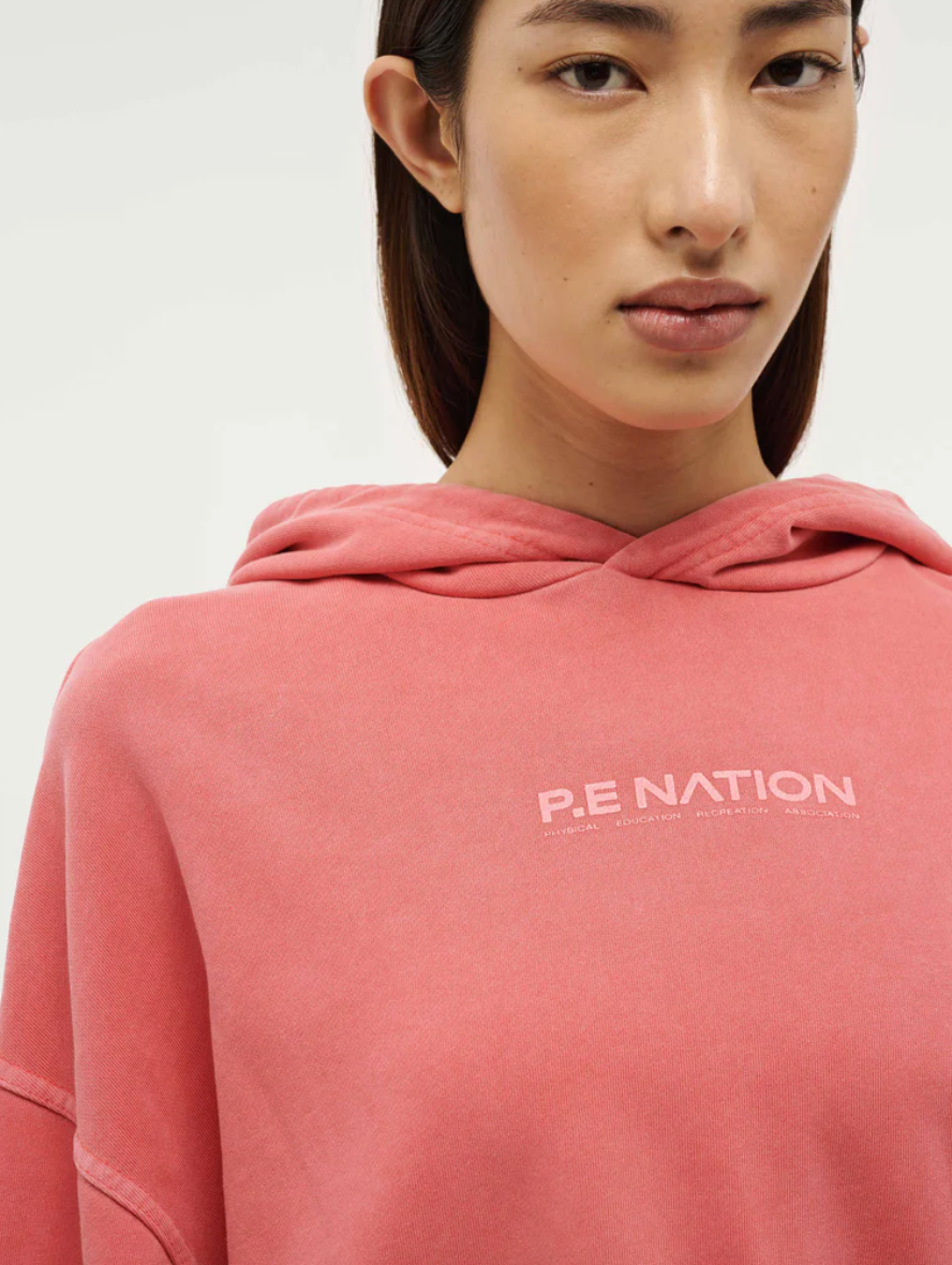 P.E. NATION TRANSITION HOODIE IN WASHED POPPY RED